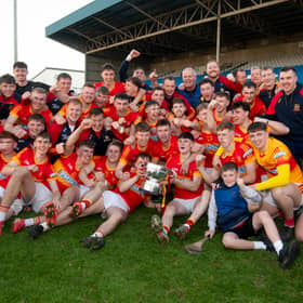 The Harps Senior Team and Management celebrate their Laois County Championship win at Laois Hire O'Moore Park 