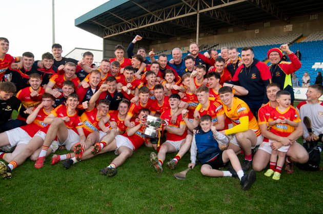 The Harps Senior Team and Management celebrate their Laois County Championship win at Laois Hire O'Moore Park 