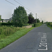 Most of a Laois bridge wall in river bed after crashes