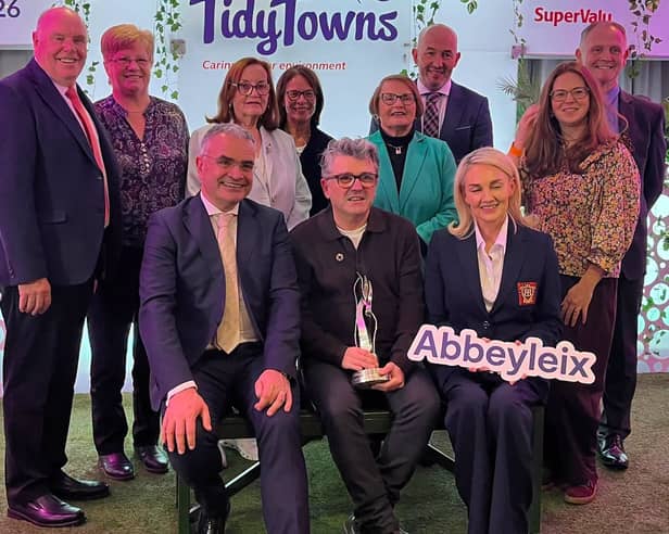 Abbeyleix TidyTowns collecting their 2026 award as Ireland's tidiest small town, from Minister Dara Colleary in Croke Park. 
