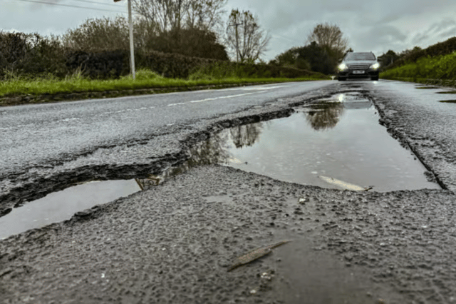 File photo of damaged road