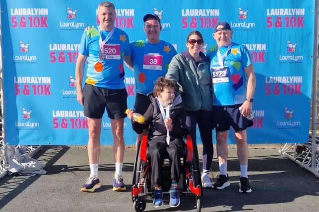 Teddy Fennelly, James Brown and Siobhan and Declan Mannion with son Jamie at the finish line of the Lauralynn 5&10k race.
