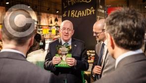 Laois TD and Minister Charlie Flanagan promotes locally farmed beef and turns the Colosseum green in Italy