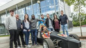 Formula 1 Carlow IT third level aerospace students raise the chequered Flag