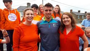 Phil Neville and Robert Sheehan among the celebs congratulating a Portlaoise school on winning its first Amber Flag