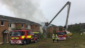 Two apartments "completely burned out" and four "badly damaged" in a fire over the weekend in Laois