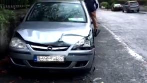 Passing car crashed into two parked cars on busy N80 road through Mountmellick
