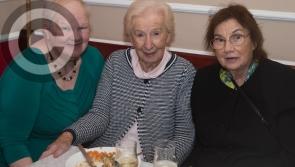 Former Fianna Fáil Laois TD cuts the cake at senior citizens party in Ballacolla