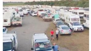 “Born-again” Travellers holding Christian prayer meetings  in field beside M7 