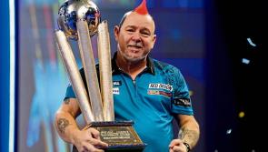Peter Wright holds nerve to win second world Darts title