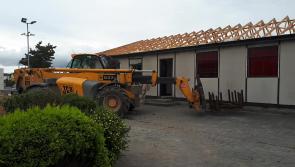 Watch: Asbestos roof tiles removed as part of the demolition of Portlaoise primary school