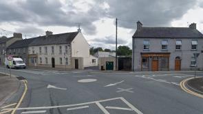 Sinking road and treacherous path at busy junction in Laois town