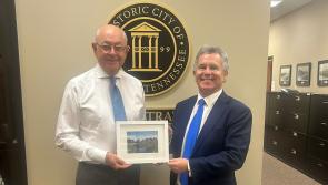 Painting of Rock of Dunamase gifted during visit to strengthen Laois Links in Tennessee
