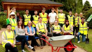 Laois business rolls up sleeves and volunteers with Abbeyleix Tidy Towns