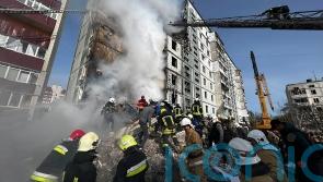 Dozens of people including children dead after missile and drone attacks hit Ukraine