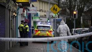 Two men due in court in relation to death of suspected restaurant gunman