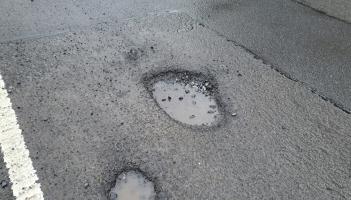 Potholes no sooner filled are reappearing on a Laois road, meeting hears
