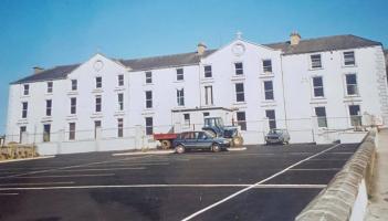 Laois community joy as rescued Abbeyleix historic cross comes home