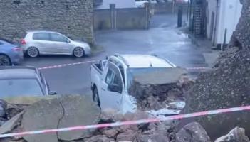 Historic stone wall smashes onto parked cars in Laois town