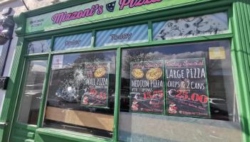 Front window of Portlaoise pizzeria smashed