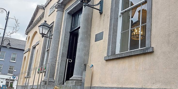 Accused of producing a hurley and assaulting a woman in Laois