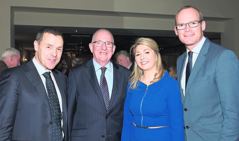 Minister Simon Coveney may be warming up for battle in GAA style