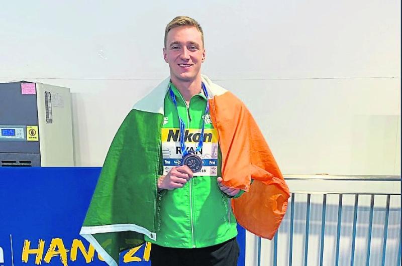 Laois swimmer sets Irish record in qualifying for final of 100m Backstroke in Glasgow