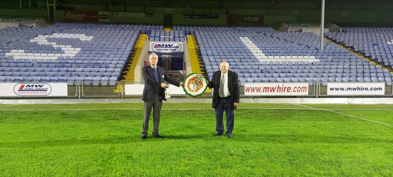 Laois GAA Chairman Peter O'Neill pictured with big Laois GAA supporter John Hyland as they remembered Bloody Sunday victims in O'Moore Park