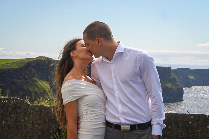 Photographer's appeal to find newly-weds