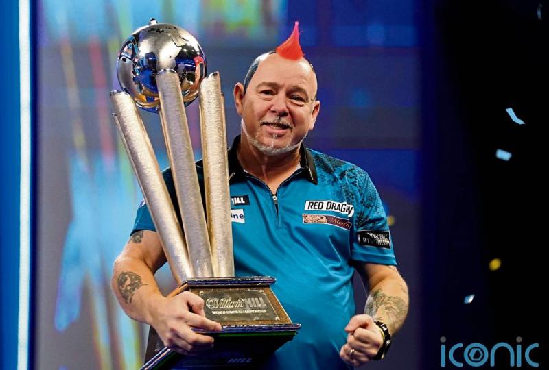Peter Wright holds nerve to win second world Darts title