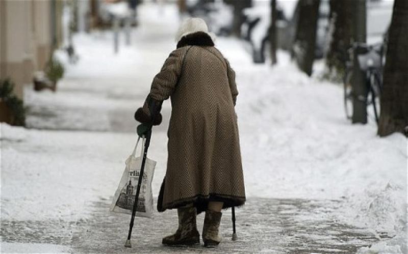Elderly woman snow warning