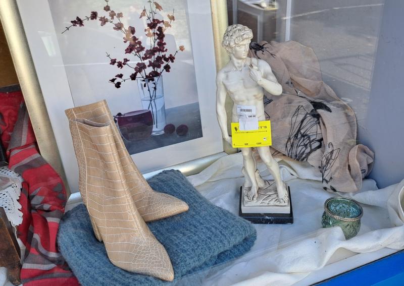Strategically statuette price tag in window of Portlaoise charity shop