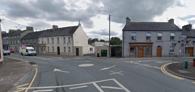 Sinking road and treacherous path at busy junction in Laois town