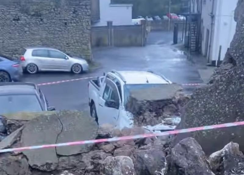 Historic stone wall smashes onto parked cars in Laois town
