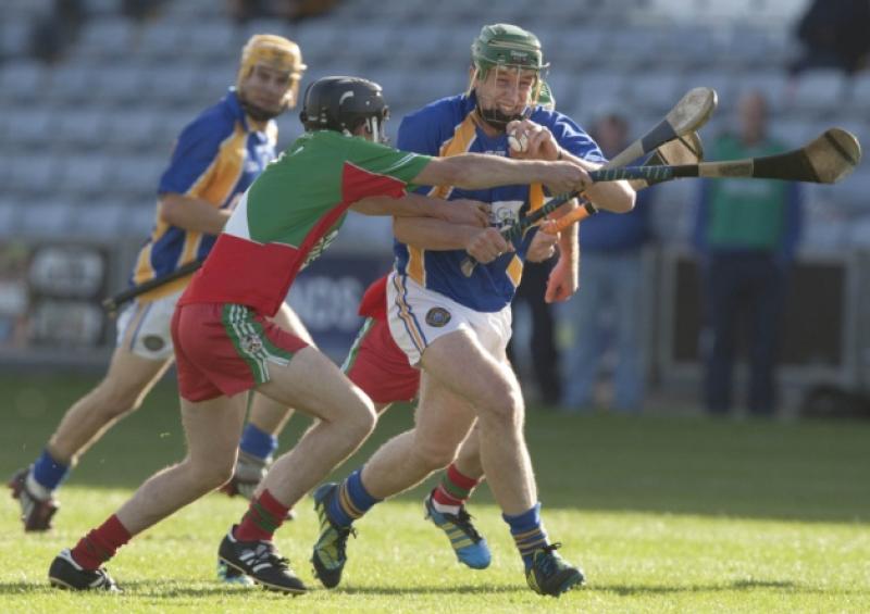 Willie Dunphy, Clough Ballacolla is closed down by Steven Finan, Borris in Ossory Kilcotton in the SHC semi-final at O'Moore Park.Picture: Alf Harvey/hrphoto.ie