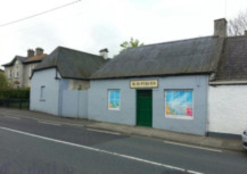 Emo's old post office is on the market.