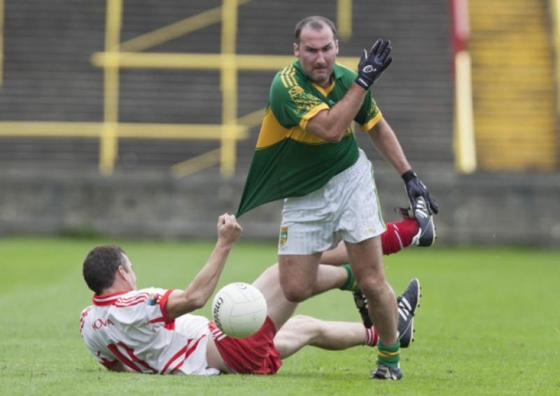 Gary Walsh, Ballylinan has his jersey tested by Glenn Brophy, Emo in the SFC at O'Moore Park. Picture: Alf Harvey/hrphoto.ie
