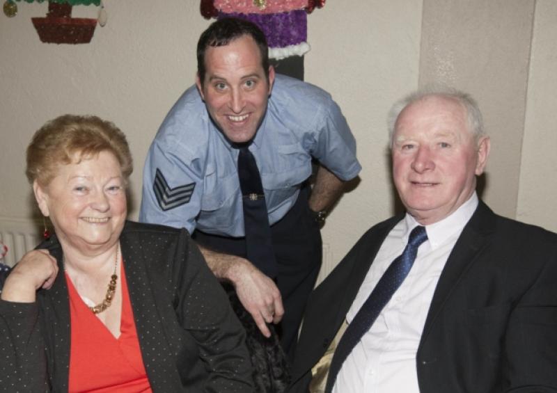 Dan and Patty Lalor with Sgt Michael Carey at the Abbeyleix Senior Citizens party in Abbeyleix Parish Hall.Picture: Alf Harvey/hrphoto.ie
