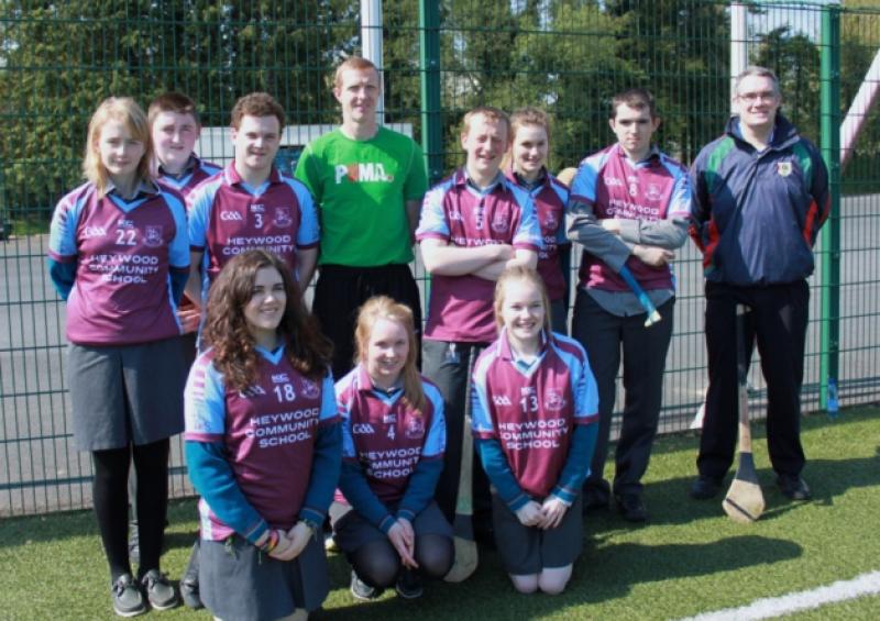 The Heywood Community School Bank Management Team with Kilkenny Hurler Henry Shefflin at a Master Class given by the hurler are front row from left: Emily Walshe, Sarah Hamm, Emma Bergin, Back row from left Lisa Daly, Christopher Goode, John Oxley, Henry Shefflin, Daniel Burke, Chloe Murphy, Robbie Moffitt and Martin Fallon (Clonaslee GAA and Customer Services Bank of Ireland, Abbeyleix)