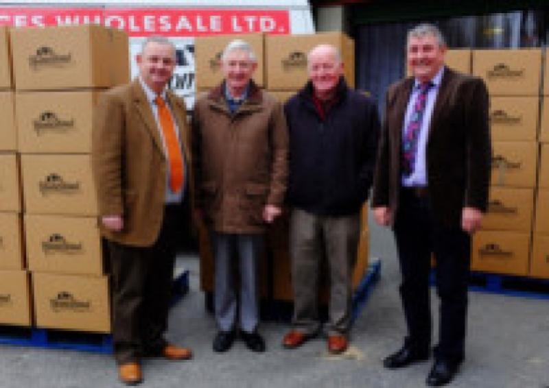 Pictured handing over 180 hampers for 4 ACES Wholesale Group are; Liam Linden (4 Aces) Colm Finnegan and John Whelan (St. V d Paul) Paschal OBrien (4 Aces).