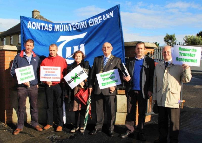 Protesting outside VEC Headquarters, Ridge Rd., Portlaoise, l/r Gilbert Burke (Sec. Laois Branch TUI) , Wm.Flanagan (Portlaoise College), Mary Higgins (Chairperson Laois Branch TUI) Gerry Craughwell (President TUI) Gerry Quinn (Vice President TUI and Staff Rep. Laois VEC) Donncha O'Riordain (Retired Members TUI)
