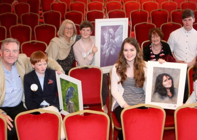 Six Laois students have been presented with top awards in this years 61st Texaco Childrens Art Competition.Luggacurren siblings Tom (14) Lucy (15) and Annie Rose Deegan (18), all pupils of Bagenalstown art teacher Iwona Nartowska, are pictured with their winning paintings alongside family (left to right): Dad Jim, Aunt Bernie, Grandmother Doreen, Colm Rowland and Mum Fionnuala.  Lucy won second prize in the 14-15 years age category of the competition while Tom and Annie Rose both won Special Merit Awards.Other Laois winners, all of whom also received Special Merit Awards at a ceremony held in Dublin recently, were Holly Lalor (7), a pupil at The Paint Pots Art Group, Ballyfin, Aoibh Foynes (15), from Clonaslee College and Lee Dixon (13), from Col�iste �osag�in, Portarlington.
