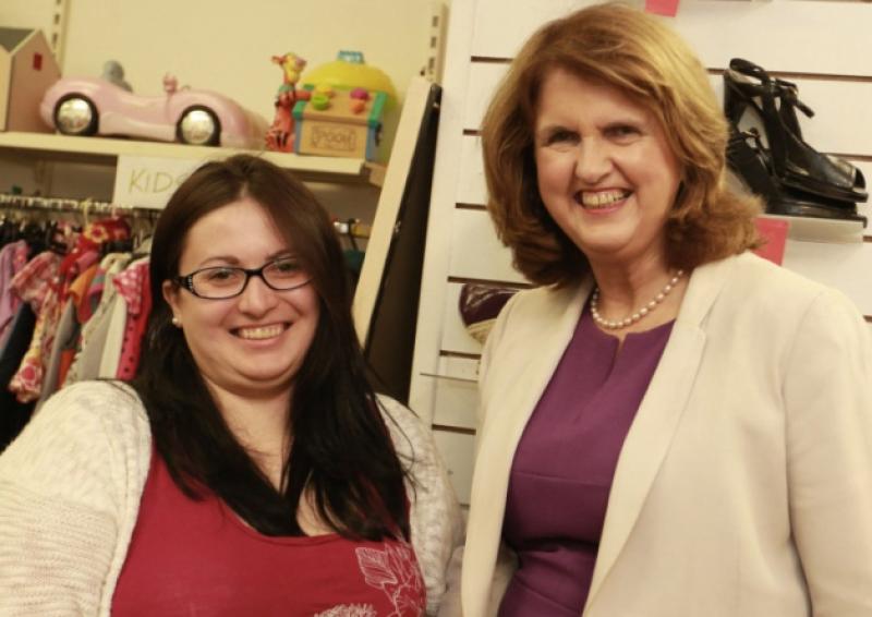 Anna Miczek , Tus Employee  , pictured with Minister for Social Protection- Joan Burton , T.D. during her visit to the N.C.B.I. Shop in Portarlington on Wednesday .         Photo: Michael Scully.