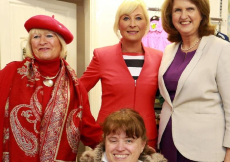 Minister for Social Protection- Joan Burton , T.D.  with d Marie Corcoran  and her daughters - Maria and Grainne ( Labour Candidate in local elections )  during her visit to the Saoirse Care Charity Shop in  Portarlington on Wednesday .           Photo: Michael Scully.