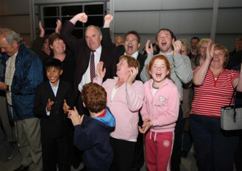 Cllr. John Joe Fennelly (Fianna Fail) celebrates with family and friends after topping the poll at Portlaoise Count Centre.Picture: Alf harvey.