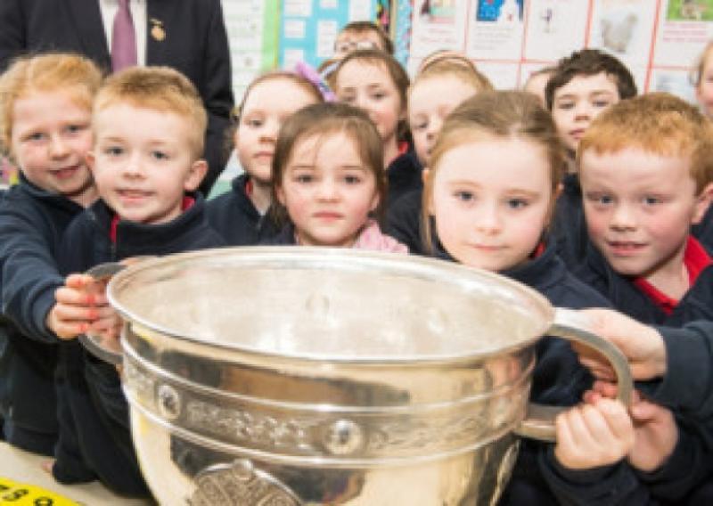 Happy Shanahoe pupils with the Sam MaGuire Cup. Photo Denis Byrne.