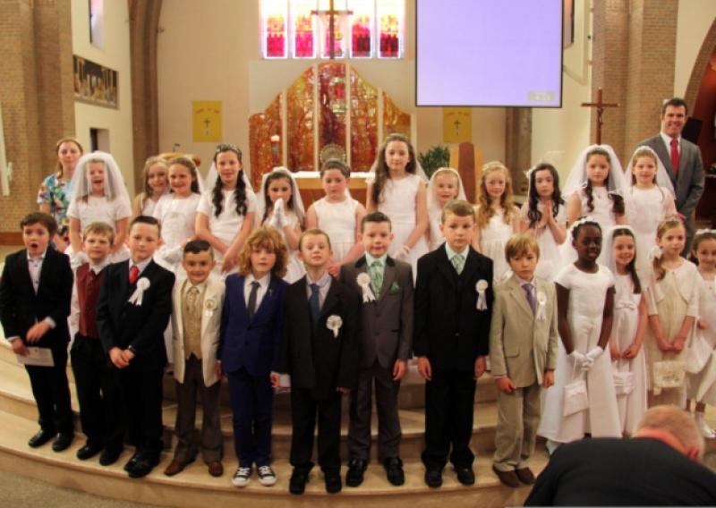 Pupils from An Gael Scoil Phortlaoise following their First Holy Communion at St. Peter and Paul's Church, Portlaoise.