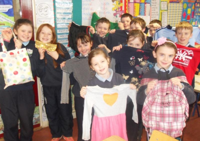 Clonaghadoo 5th and 6th class pupils with some of the clothes they recycled as part of a Greener Fashion project.