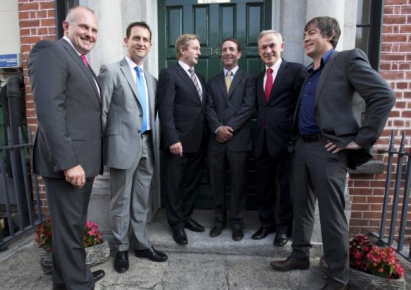 Michael McLoughlin CEO ConnectIreland, Terry Clune Founder ConnectIreland, Taoiseach Enda Kenny, Minister for Jobs Enterprise and Inovation Richard Bruton, Ted Berry MD The Magni Group and Kieran Leavy 'Connector' for the Magni Group at the jobs announcement last July.Photo:Leon Farrel