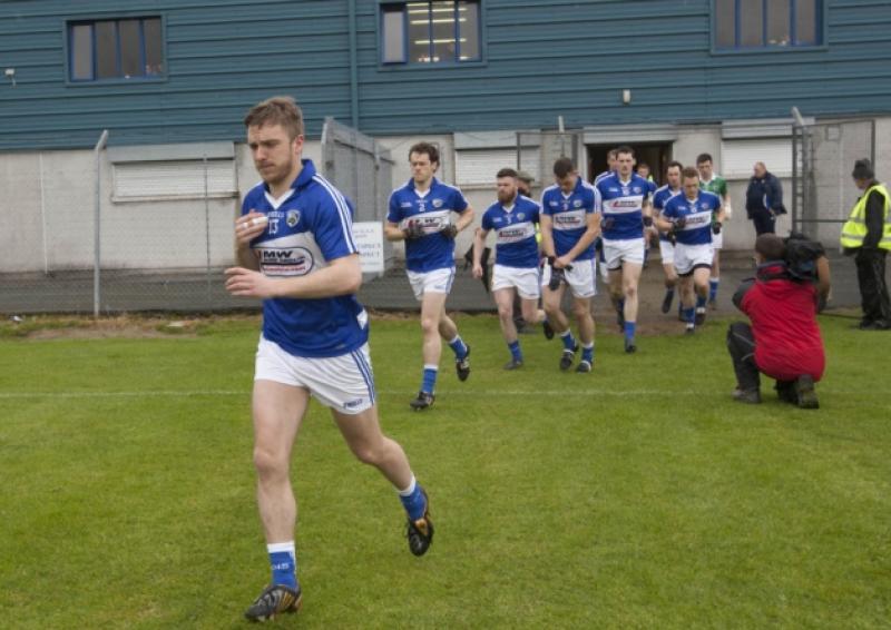 Ross Munnelly leads Laois out against Wicklow in the Leinster SFC at Aughrim.Picture: Alf Harvey/hrphoto.ie